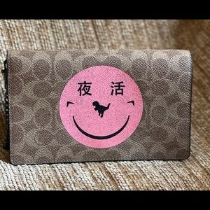 Callie Foldover Chain Clutch In Signature Canvas